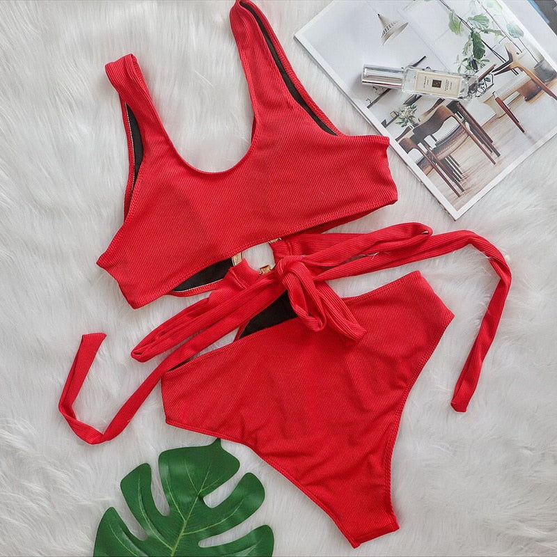 Hollow out floral one-piece swimsuit by The Clothing Company Sydney with cutouts, metal accents, push-up design, perfect for beachwear.
