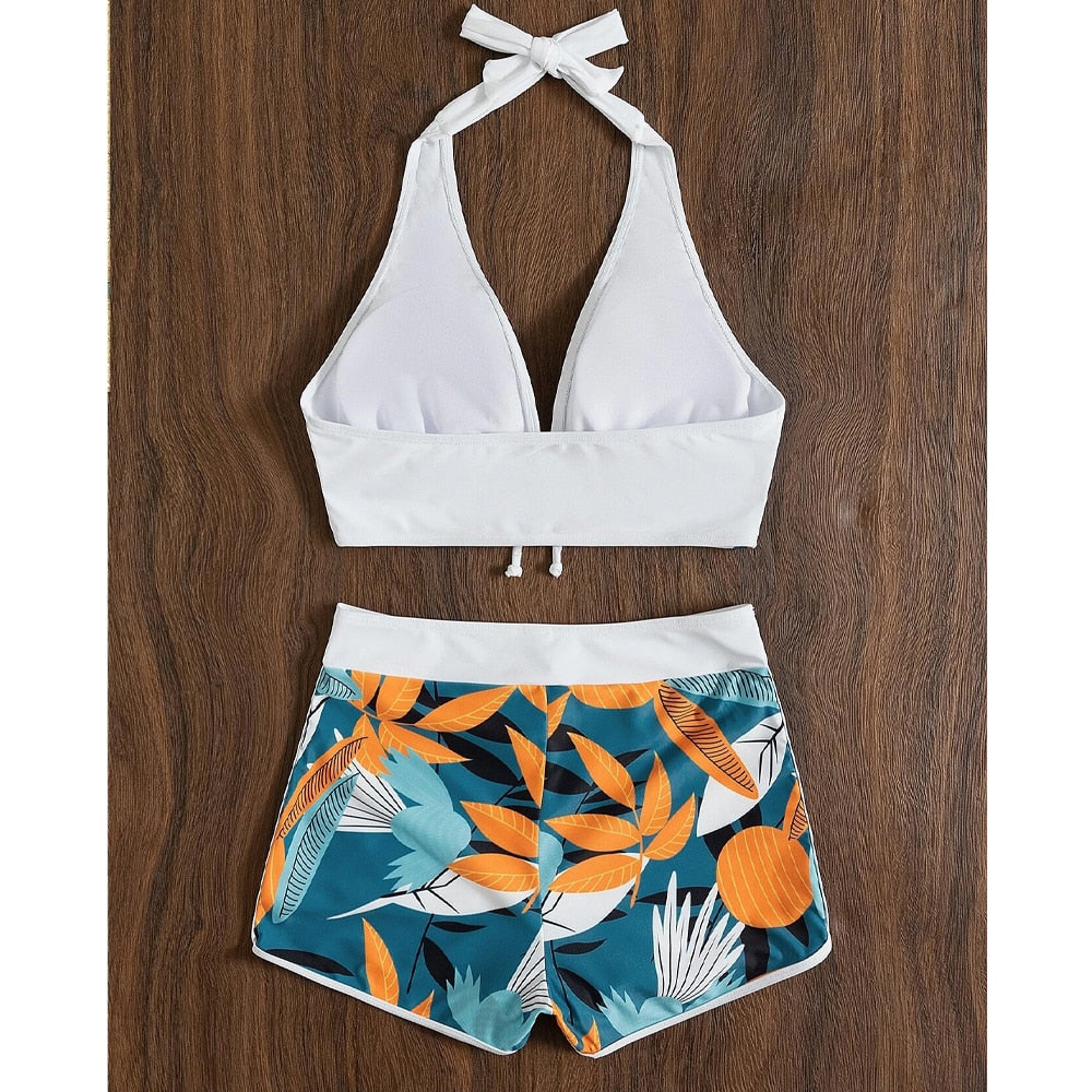 High waist print halter swimsuit with backless design and push-up shorts from The Clothing Company Sydney, perfect for beachwear.