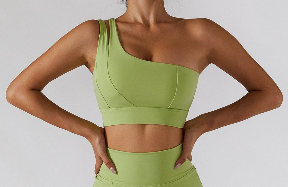 Women's yoga set with high waist leggings, skirt, and sports bra from The Clothing Company Sydney, designed for gym and fitness workouts.