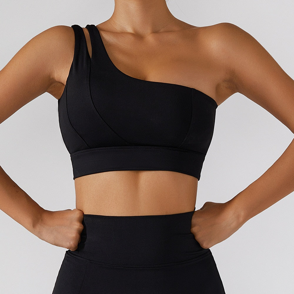 Women’s yoga set with high waist leggings, skirt, and sports bra by The Clothing Company Sydney, perfect for gym and workout.