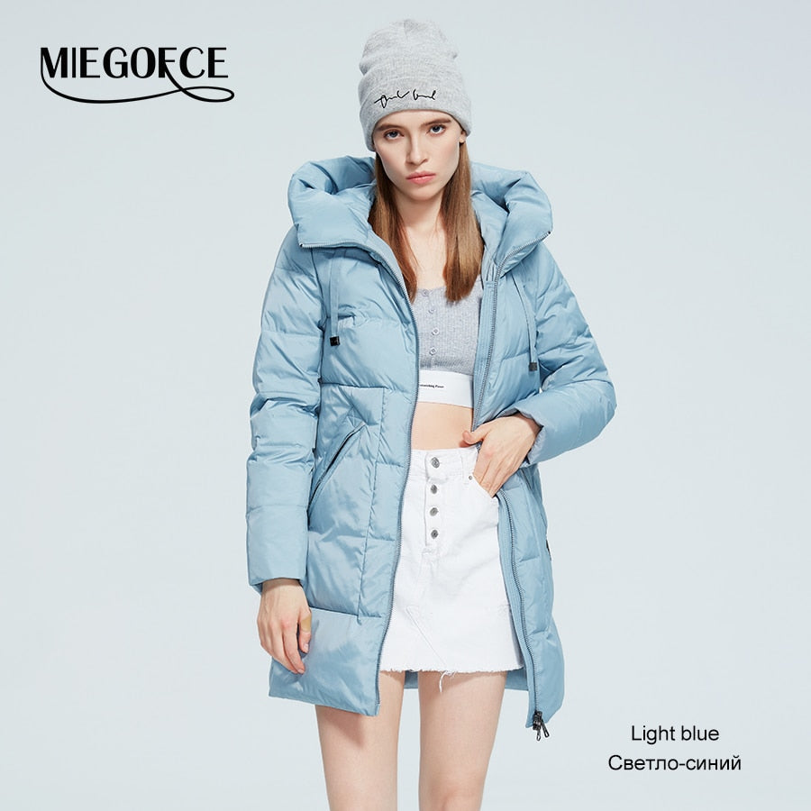 Women's winter jacket by The Clothing Company Sydney with stand collar, hood, large pockets, mid-length, windproof for cold protection.