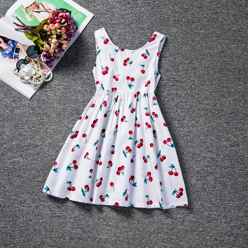 Kids’ summer princess dress by The Clothing Company Sydney with sleeveless layered tulle, floral accents, perfect for beach or birthday parties.