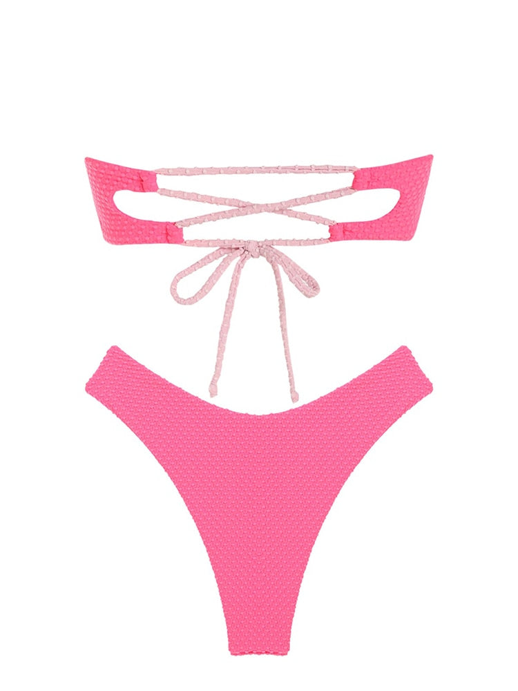 V-wired ruffle ribbed high cut bikini swimsuit with strapless design, lace-up detail, and removable padding for women.