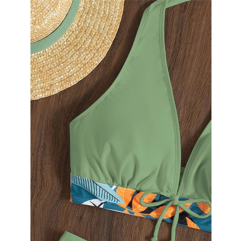 Two-piece swimsuit bikini set from The Clothing Company Sydney with lace print, high waist, halter neck, deep V-neck, and backless design.