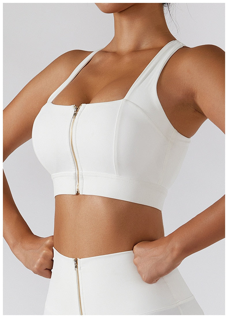 Women's yoga set by The Clothing Company Sydney with high waist leggings, skirt, and sports bra for gym workout fitness.