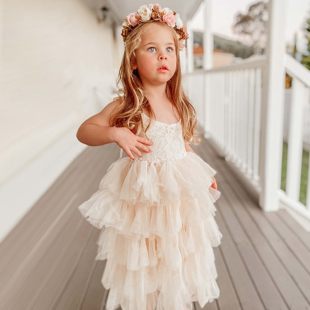 Girls' summer princess beach dress by The Clothing Company Sydney with sleeveless layered tulle skirt, floral accents, perfect for parties.
