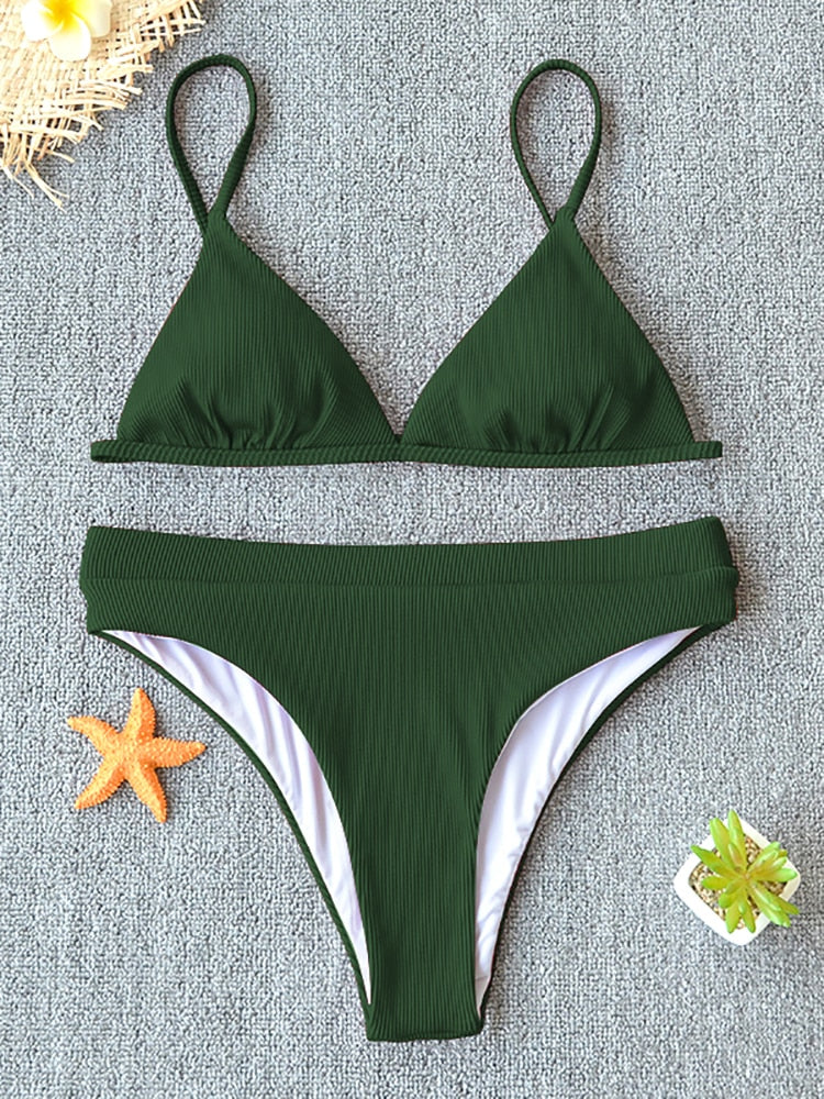 Black 2-piece metal rings micro bikini swimsuit with push-up top, Brazilian style, suitable for beachwear and swimming.