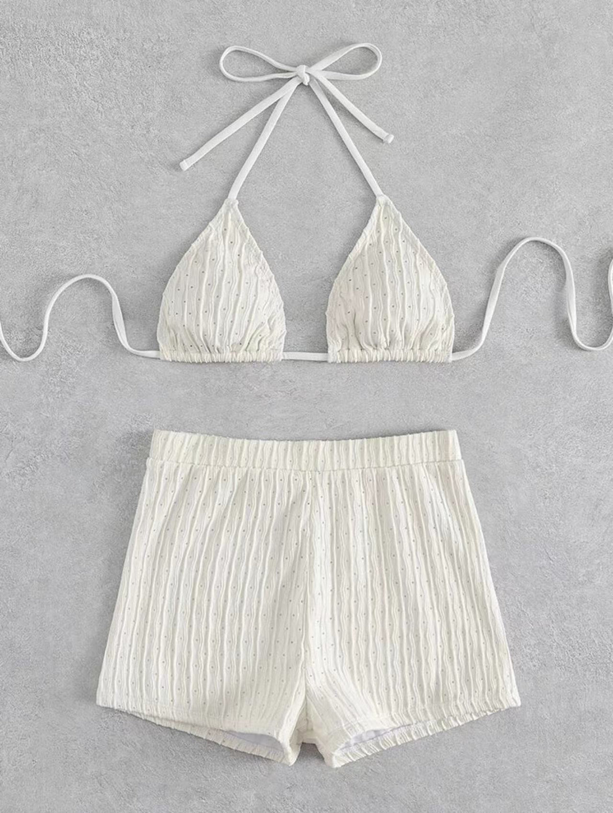 Two-piece swimsuit bikini set with lace print, high waist, halter neck, deep V-neck, and backless design from The Clothing Company Sydney.
