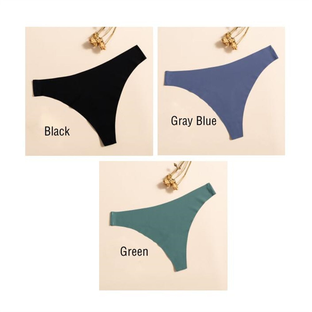 Three pairs of seamless, ultra-thin solid color ladies thong panties from The Clothing Company Sydney, displayed flat.