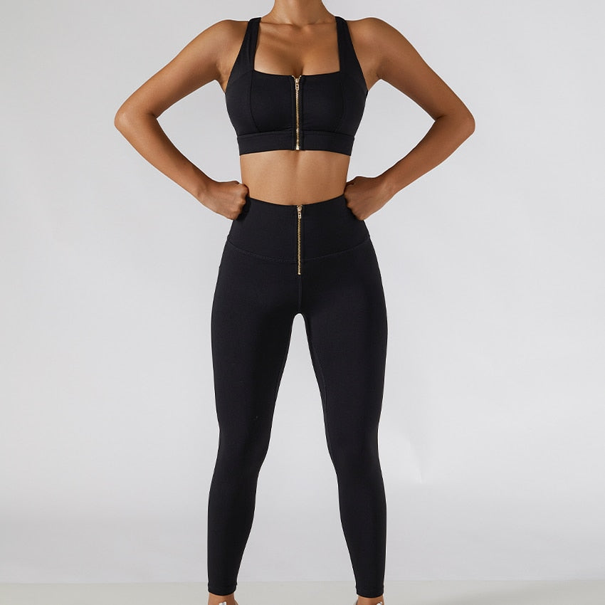 Women's yoga set with high waist leggings, skirt, and sports bra from The Clothing Company Sydney, designed for gym workouts.