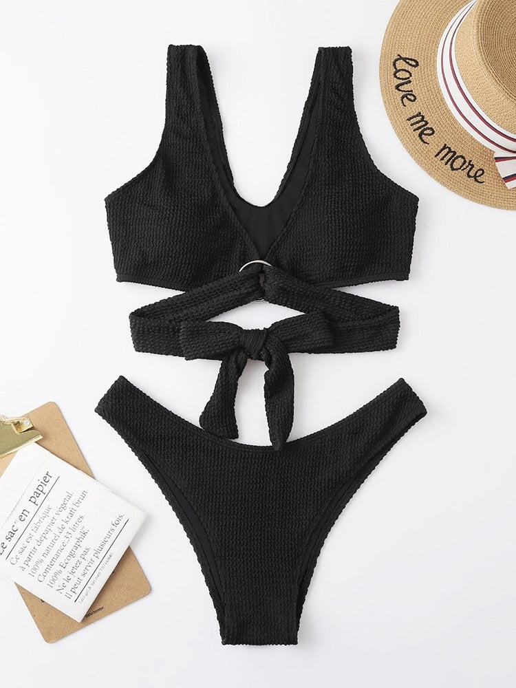 Metal ring textured bikini swimsuit by The Clothing Company Sydney featuring push-up style, bandage design, and beachwear appeal.