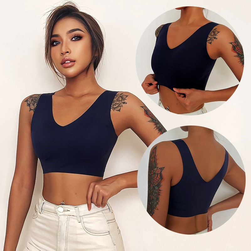 Seamless sports bra from The Clothing Company Sydney featuring plunge design, push-up padding, deep V neckline, and bralette style.