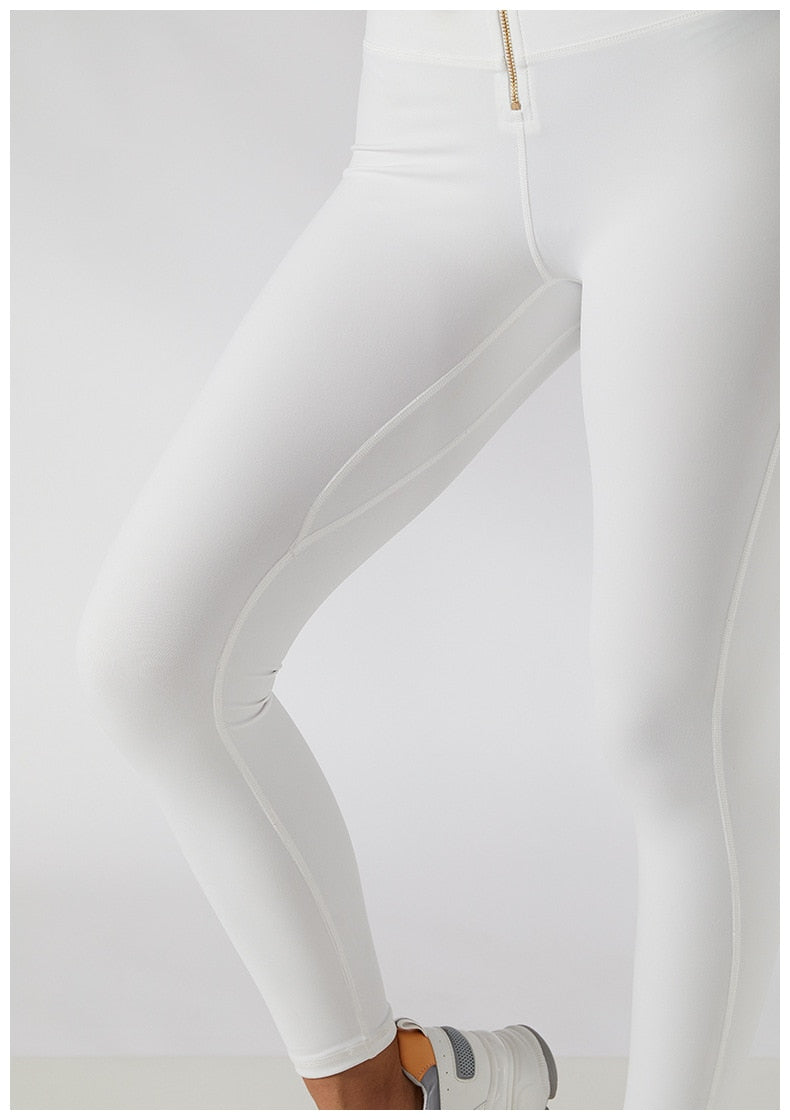 Two-piece women's yoga fitness set with high waist leggings, skirt overlay, and zipper sports bra by The Clothing Company Sydney.