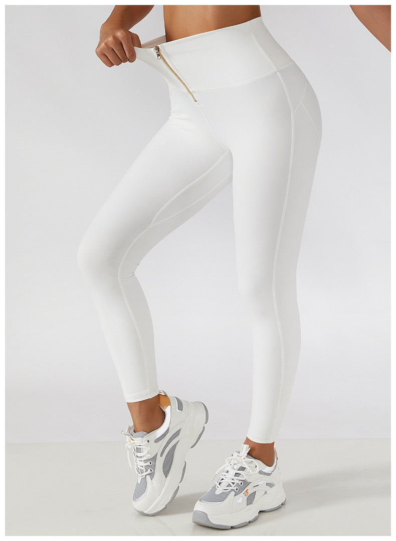 Two-piece women's yoga set with high waist leggings, skirt, and sports bra from The Clothing Company Sydney, ideal for fitness workouts.