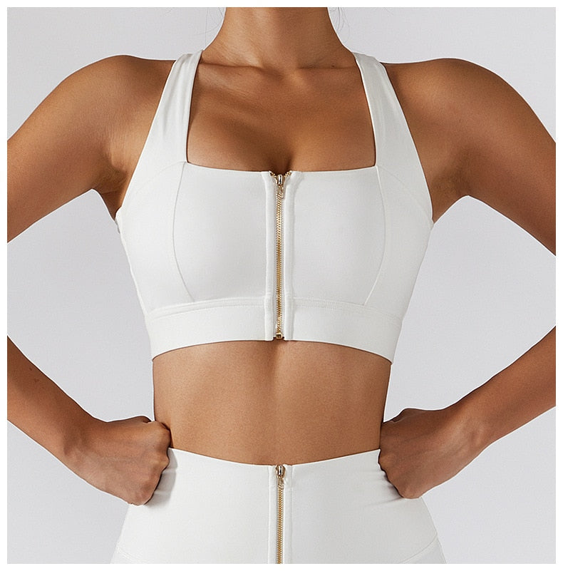 Women's yoga set with high waist leggings, skirt, and sports bra from The Clothing Company Sydney, ideal for gym and fitness workouts.