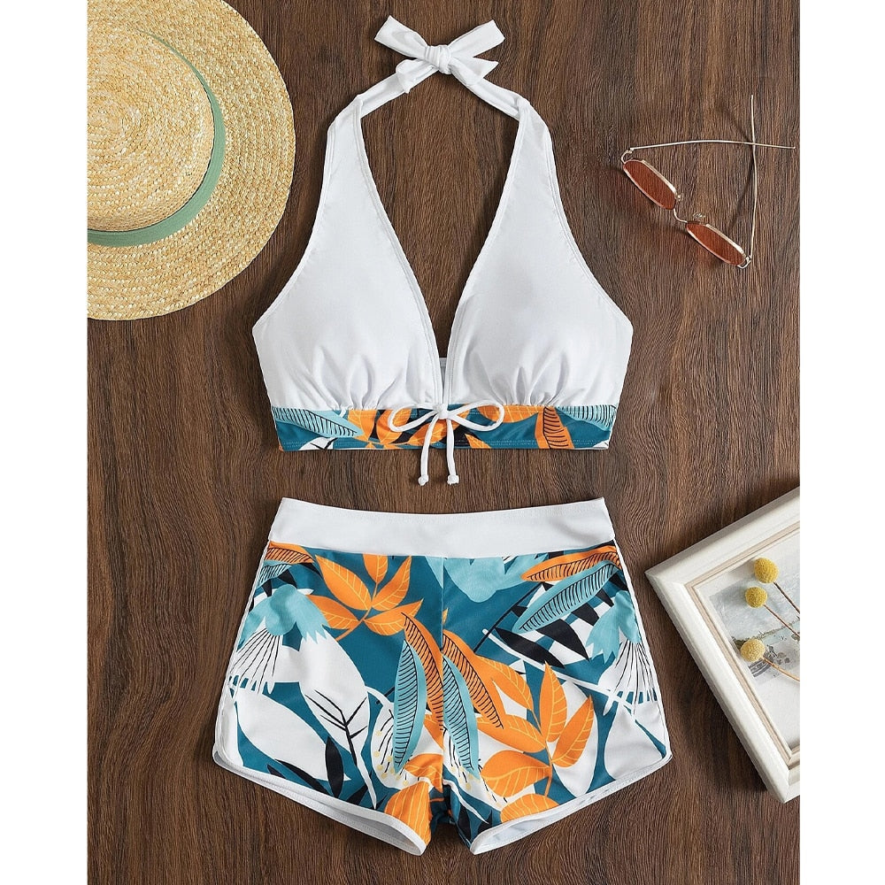 Backless high waist bikini set with print tie halter top and push-up shorts, perfect for beach and swimwear by The Clothing Company Sydney