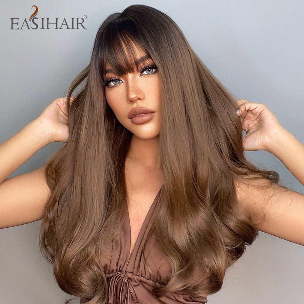Long, wavy synthetic wig in mixed blonde and brown with bangs, heat-resistant, designed for women’s daily wear and cosplay.