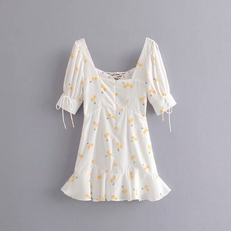 Elegant vintage summer white and yellow cherry print mini dress with puff sleeves, high waist, and silky lining from The Clothing Company Sydney