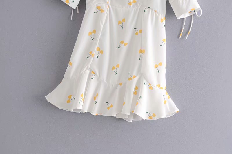 Elegant vintage summer dress by The Clothing Company Sydney featuring white and yellow cherry print, puff sleeves, high waist, silk-like fabric.