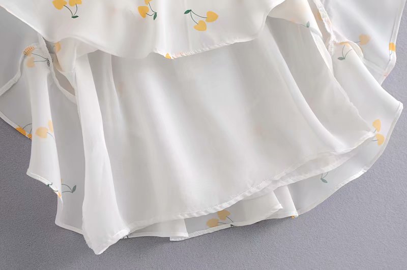 Elegant vintage summer dress by The Clothing Company Sydney featuring white and yellow cherry print, puff sleeves, high waist, and silk-like fabric.