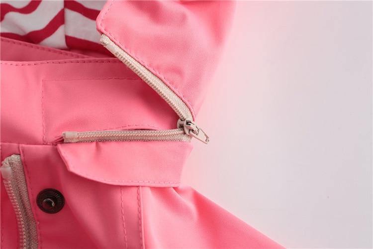 Kids waterproof hooded windbreaker jacket with pockets, cotton lining, suitable for boys and girls by The Clothing Company Sydney.