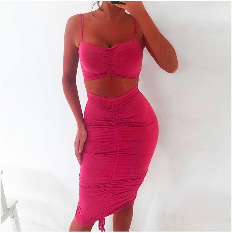 Green two-piece summer outfit for women featuring a ruched crop top and matching tight skirt, stylish club wear from The Clothing Company Sydney.