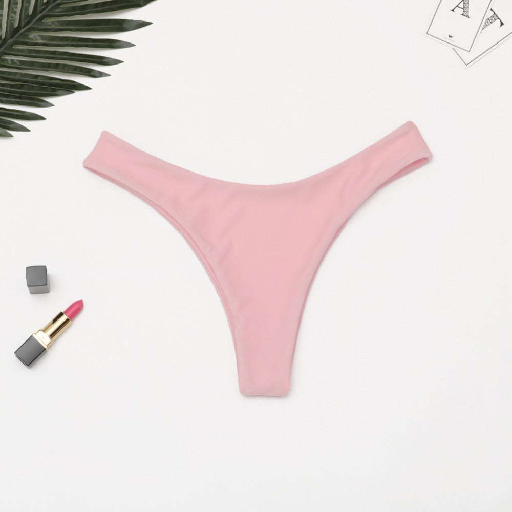 Brazilian women's bikini bottoms by The Clothing Company Sydney, low waist thong swimwear with solid cheeky coverage.