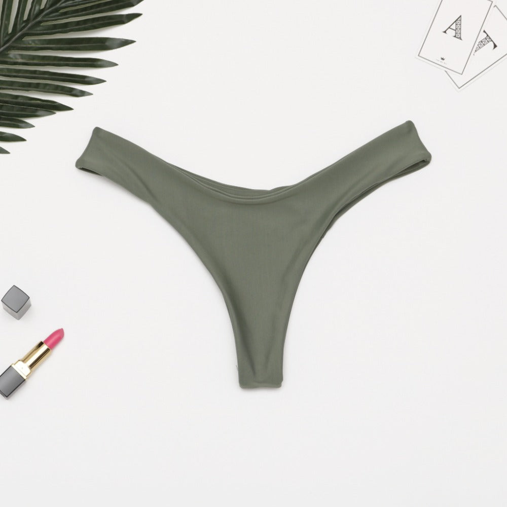 Brazilian women's thong bikini bottoms by The Clothing Company Sydney, low waist solid swim briefs with cheeky fit.