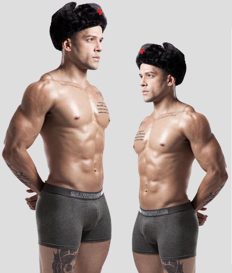Four-pack men's cotton boxer underwear from The Clothing Company Sydney, breathable solid color boxers with flexible fit.