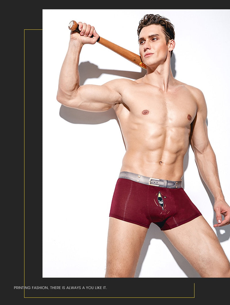 Four pairs of men's boxer briefs from The Clothing Company Sydney, featuring printed, breathable U-convex trunks with soft fabric.
