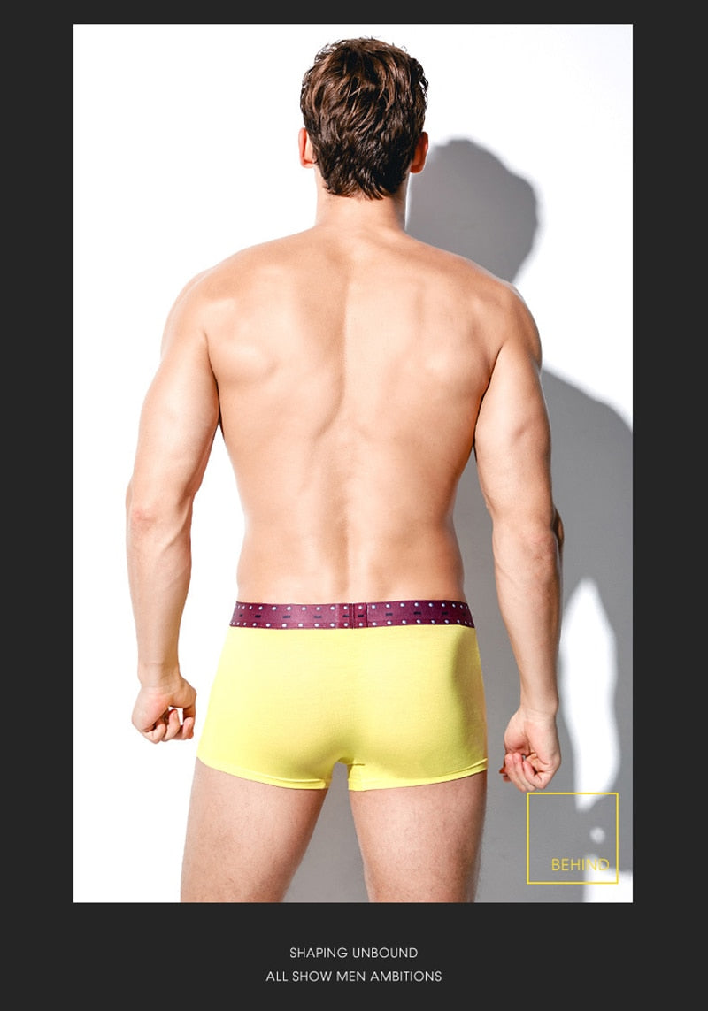 Four pairs of The Clothing Company Sydney men's boxer briefs with U-convex design, printed patterns, and breathable soft fabric.