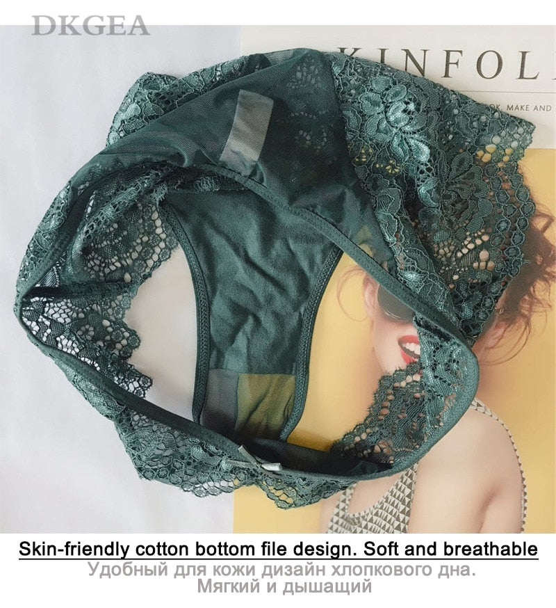 Three-piece set of low-rise white, green, and red lace underwear with transparent panels and embroidery by The Clothing Company Sydney.