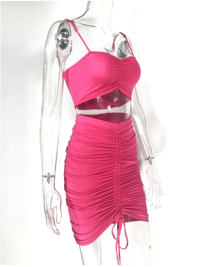 Green women's summer two-piece outfit with ruched crop top and matching skirt, designed for club wear by The Clothing Company Sydney.