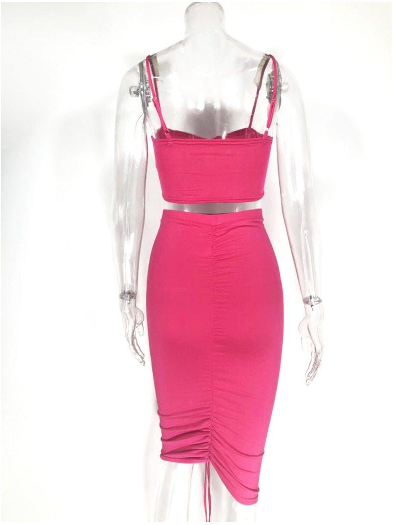 Green two-piece summer dress set for women featuring a ruched crop top and matching skirt, from The Clothing Company Sydney.