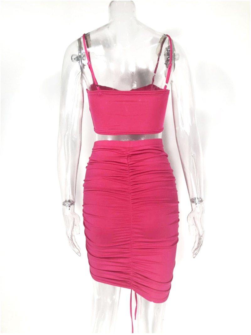 Green summer two-piece dress set for women featuring a ruched crop top and matching skirt, from The Clothing Company Sydney.