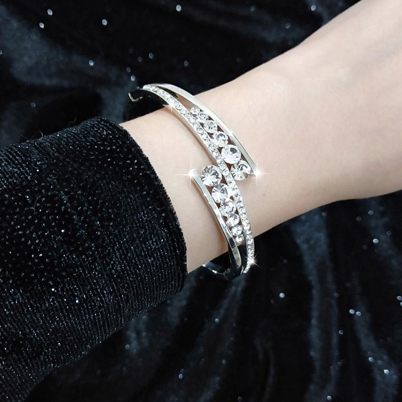 Elegant cubic zirconia hollow bangle cuff bracelet with sparkling crystals, designed by The Clothing Company Sydney.