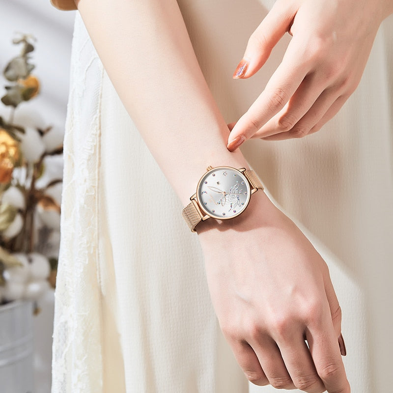 Luxury crystal rose gold steel mesh ladies wrist watch with bracelet design, featuring elegant craftsmanship and a sophisticated style.