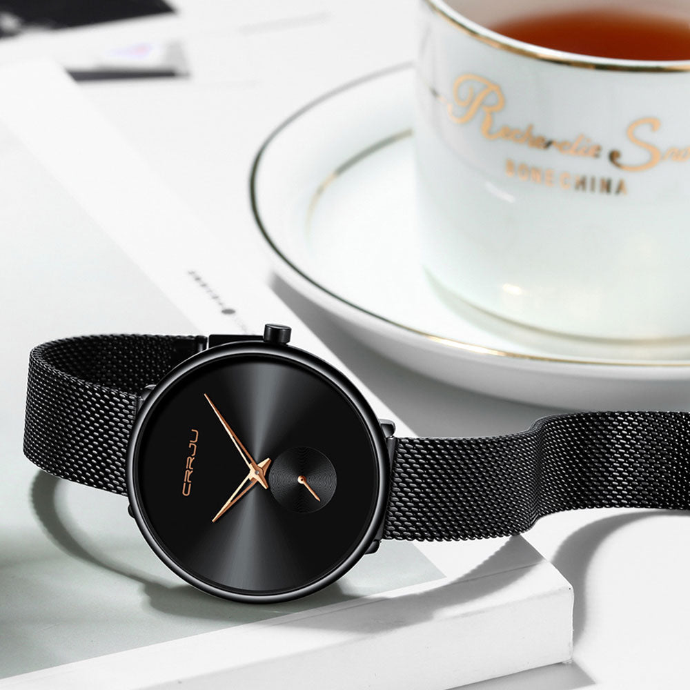 Minimalist women's waterproof quartz wristwatch with mesh strap from The Clothing Company Sydney, suitable for daily casual wear.