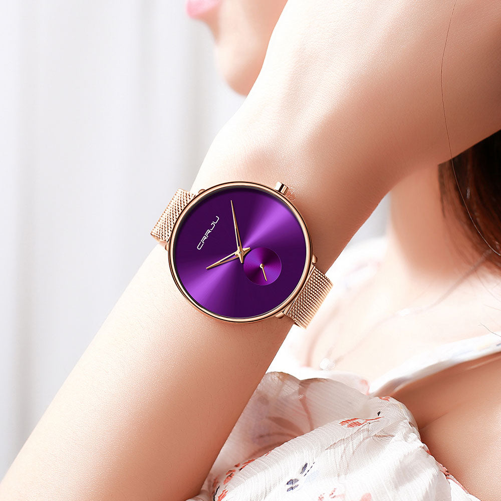 Minimalist waterproof quartz wristwatch for women with a sleek mesh band, designed for everyday casual wear.