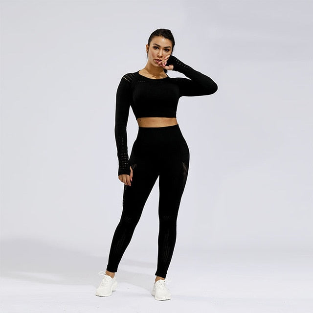 The Clothing Company Sydney fitness set with two-piece sports yoga gym leggings and long sleeve seamless hollow-out top.