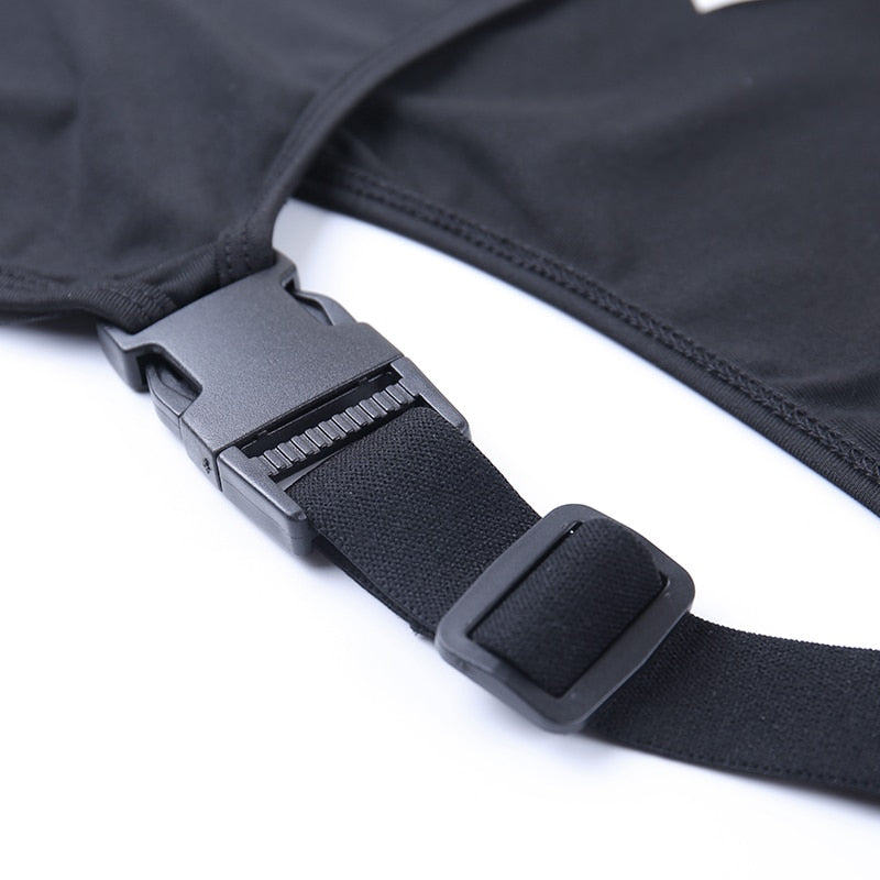 Black solid high street bodysuit with hollow out design, buckle details, sleeveless backless style, by The Clothing Company Sydney.