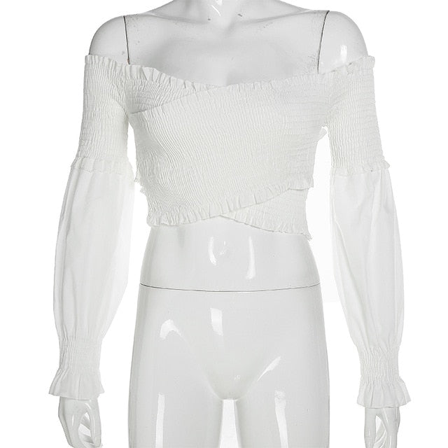 White long sleeve off-shoulder blouse with smocking and criss-cross details, stylish crop top for women by The Clothing Company Sydney.