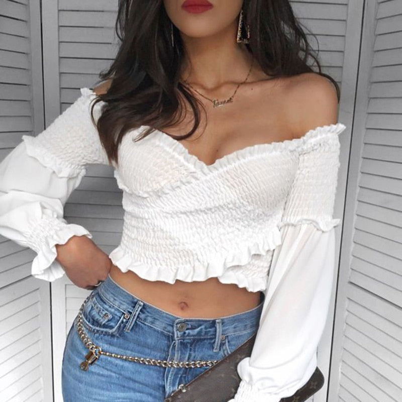 White smocking off-shoulder blouse for women with long sleeves and criss-cross design, by The Clothing Company Sydney.