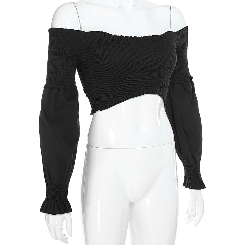 White women's long sleeve smocking blouse with off-shoulder, criss-cross detail, from The Clothing Company Sydney, stylish crop top.