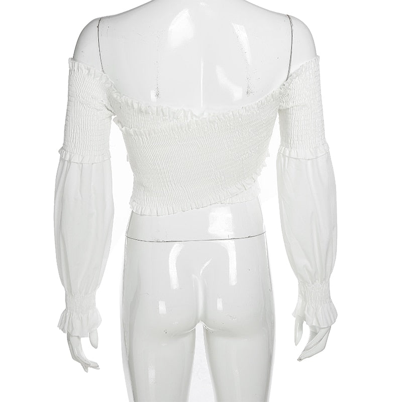 White smocking long sleeve off-shoulder crop top for women by The Clothing Company Sydney, featuring criss-cross design and chic style.