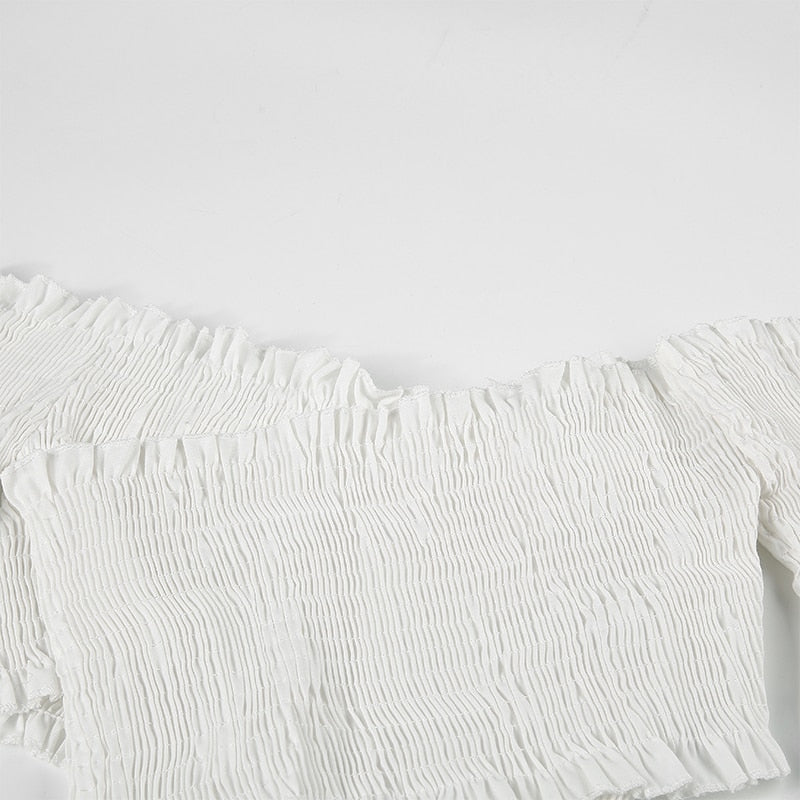 White fashion chic smocking crop top for women with long sleeves, off-shoulder style, criss-cross design from The Clothing Company Sydney