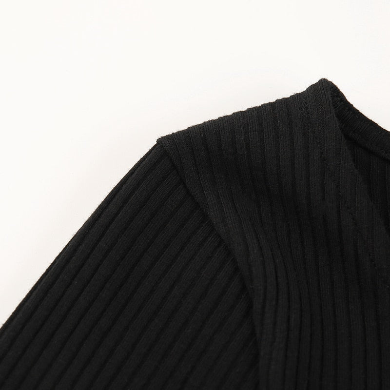 Autumn winter skinny long sleeve button-up bodysuit by The Clothing Company Sydney, showcasing a fitted design in a cozy fabric.