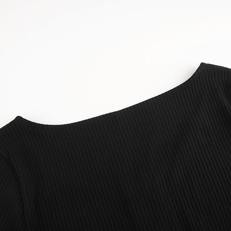 Autumn winter skinny long sleeve button-up bodysuit by The Clothing Company Sydney, shown in a close-up view of the fitted design.