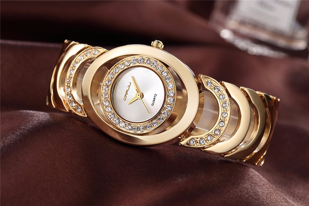 Ladies' luxury stainless steel bracelet watch with rhinestones and quartz movement, stylish and elegant from The Clothing Company Sydney.