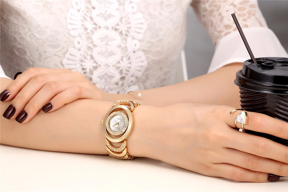 Ladies' luxury stainless steel bracelet watch with rhinestones and quartz movement from The Clothing Company Sydney.